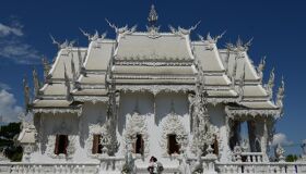 Tourists in front of White Temples in Chiang Rai, Thailand